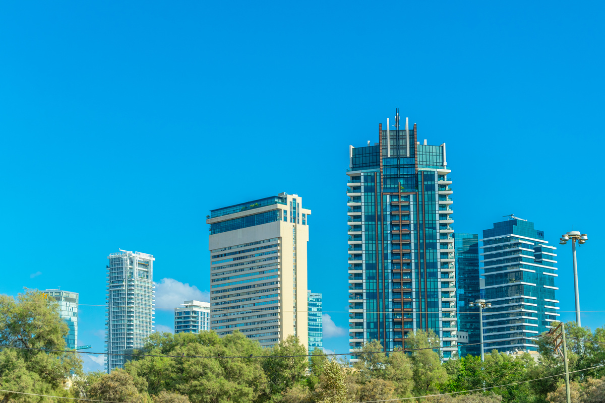 Glass and steel skyscrapers erected over Rothschild boulevard in Tel Aviv, Israel